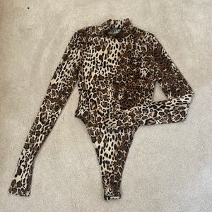 Cheetah turtleneck top